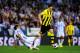 MALAGA, SPAIN - APRIL 03: Robert Lewandowski of Borussia Dortmund duels for the ball with Martin Gaston Demichelis of Malaga CF during the UEFA Champions League quarter-final first leg match between Malaga CF and Borussia Dortmund at La Rosaleda Stadium on April 3, 2013 in Malaga, Spain. (Photo by David Ramos/Getty Images)