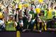 PASADENA, CA - JANUARY 02: Oregon Ducks fans cheer on their team before the start ofrthe 98th Rose Bowl Game between the Ducks and the Wisconsin Badgers on January 2, 2012 in Pasadena, California. (Photo by Harry How/Getty Images)