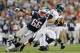 FOXBORO, MA - AUGUST 20: Jake Bequette #66 of the New England Patriots attempts during bring down Nick Foles #9 of the Philadelphia Eagles during a preseason game at Gillette Stadium on August 20, 2012 in Foxboro, Massachusetts. (Photo by Jim Rogash/Getty Images)