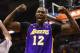 SAN ANTONIO, TX - APRIL 24: Dwight Howard #12 of the Los Angeles Lakers reacts after being fouled against the San Antonio Spurs during Game Two of the Western Conference Quarterfinals of the 2013 NBA Playoffs at AT&T Center on April 24, 2013 in San Antonio, Texas. NOTE TO USER: User expressly acknowledges and agrees that, by downloading and or using this photograph, User is consenting to the terms and conditions of the Getty Images License Agreement. (Photo by Ronald Martinez/Getty Images)
