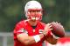 FOXBORO, MA - JUNE 11: Tim Tebow #5 of the New England Patriots practices during minicamp at Gillette Stadium on June 11, 2013 in Foxboro, Massachusetts. (Photo by Jared Wickerham/Getty Images)