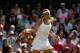 LONDON, ENGLAND - JULY 04: Sabine Lisicki of Germany hits a forehand during the Ladies Singles semi final match against Agnieszka Radwanska of Poland on day ten of the Wimbledon Lawn Tennis Championships at the All England Lawn Tennis and Croquet Club on July 4, 2013 in London, England. (Photo by Clive Brunskill/Getty Images)