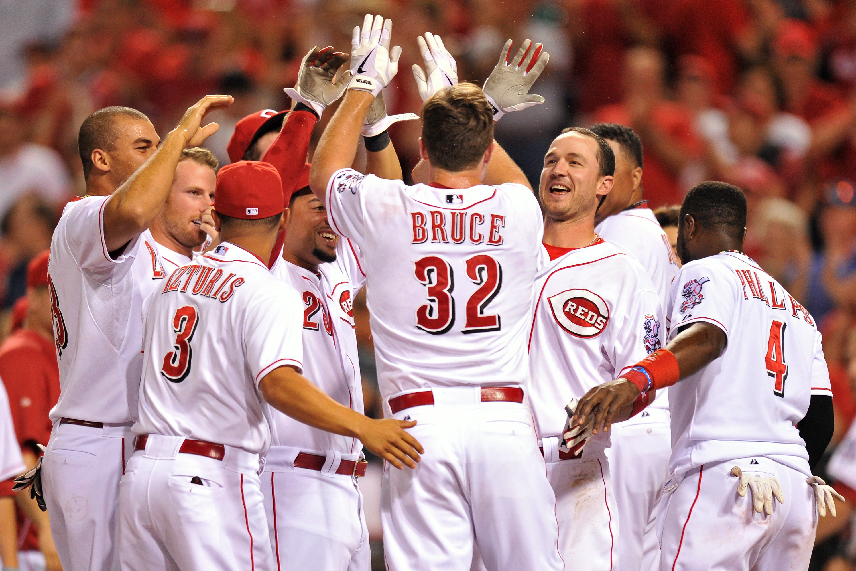 Frazier's homer rallies Reds to opening 5-2 win over Pirates