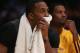 LOS ANGELES, CA - APRIL 26: Dwight Howard (L) #12 and Devin Ebanks #3 of the Los Angeles Lakers look on from the bench in the second half against the San Antonio Spurs during Game Three of the Western Conference Quarterfinals of the 2013 NBA Playoffs at Staples Center on April 26, 2013 in Los Angeles, California. The Spurs defeated the Lakers 120-89. (Photo by Jeff Gross/Getty Images)