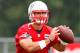 FOXBORO, MA - JUNE 11: Tim Tebow #5 of the New England Patriots practices during minicamp at Gillette Stadium on June 11, 2013 in Foxboro, Massachusetts. (Photo by Jared Wickerham/Getty Images)