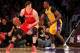 LOS ANGELES, CA - APRIL 17: Omer Asik #3 of the Houston Rockets controls the ball against Dwight Howard #12 of the Los Angeles Lakers at Staples Center on April 17, 2013 in Los Angeles, California. NOTE TO USER: User expressly acknowledges and agrees that, by downloading and or using this photograph, User is consenting to the terms and conditions of the Getty Images License Agreement. (Photo by Stephen Dunn/Getty Images)