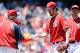 WASHINGTON, DC - JUNE 22: Starting pitcher Dan Haren #15 of the Washington Nationals hands the ball to manager Davey Johnson #5 as he is pulled in the fourth inning during a game against the Colorado Rockies at Nationals Park on June 22, 2013 in Washington, DC. (Photo by Patrick McDermott/Getty Images)