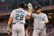 May 31, 2013; Minneapolis, MN, USA; Seattle Mariners first baseman Kendrys Morales (8) celebrates with designated hitter Raul Ibanez (28) after hitting a two run home run in the sixth inning against the Minnesota Twins at Target Field. Mandatory Credit: Jesse Johnson-USA TODAY Sports