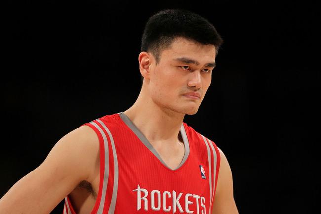 T-Mac, Yao help Rockets to rout of Nets