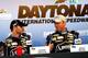 Jimmie Johnson and Chad Knaus smiles after going from victory lane to the media center at Daytona. Credit: Dwight Drum