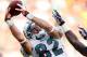 MIAMI GARDENS, FL - SEPTEMBER 18: Receiver Brian Hartline #82 of the Miami Dolphins makes a catch against the Houston Texans at Sun Life Stadium on September 18, 2011 in Miami Gardens, Florida. (Photo by Marc Serota/Getty Images)