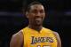 LOS ANGELES, CA - APRIL 06: Metta World Peace #15 of the Los Angeles Lakers smiles during the game against the Houston Rockets at Staples Center on April 6, 2012 in Los Angeles, California. NOTE TO USER: User expressly acknowledges and agrees that, by downloading and or using this photograph, User is consenting to the terms and conditions of the Getty Images License Agreement. (Photo by Harry How/Getty Images)