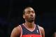 NEW YORK, NY - APRIL 15: John Wall #2 of the Washington Wizards takes the foul shot against the Brooklyn Nets at the Barclays Center on April 15, 2013 in New York City. The Nets defeated the Washington Wizards 106-101. NOTE TO USER: User expressly acknowledges and agrees that, by downloading and/or using this photograph, user is consenting to the terms and conditions of the Getty Images License Agreement. (Photo by Bruce Bennett/Getty Images)