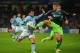 MANCHESTER, ENGLAND - NOVEMBER 06: Toby Alderweireld of Ajax challenges Carlos Tevez of Manchester City during the UEFA Champions League Group D match between Manchester City FC and Ajax Amsterdam at the Etihad Stadium on November 6, 2012 in Manchester, England. (Photo by Michael Regan/Getty Images)