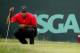 ARDMORE, PA - JUNE 16: Tiger Woods of the United States lines up a putt on the second hole during the final round of the 113th U.S. Open at Merion Golf Club on June 16, 2013 in Ardmore, Pennsylvania. (Photo by Rob Carr/Getty Images)