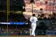 LOS ANGELES, CA - JULY 12: Yasiel Puig #66 of the Los Angeles Dodgers walks to take his positon after grounding out to end the third inning against the Colorado Rockies at Dodger Stadium on July 12, 2013 in Los Angeles, California. (Photo by Stephen Dunn/Getty Images)