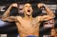 May 14, 2012; Fairfax, VA, USA; Dustin Poirier reacts after weighing in for his fight against the Korean Zombie during the Korean Zombie vs Poirier weigh-in at Patriot Center. Mandatory Credit: Rafael Suanes-USA TODAY Sports