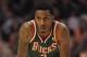 CHICAGO, IL - JANUARY 27: Brandon Jennings #3 of the Milwaukee Bucks waits as a player for the Chicago Bulls shoots a free-throw at the United Center on January 27, 2012 in Chicago, Illinois. The Bulls defeated the Bucks 107-100. NOTE TO USER: User expressly acknowledges and agrees that, by downloading and or using this photograph, User is consenting to the terms and conditions of the Getty Images License Agreement. (Photo by Jonathan Daniel/Getty Images)