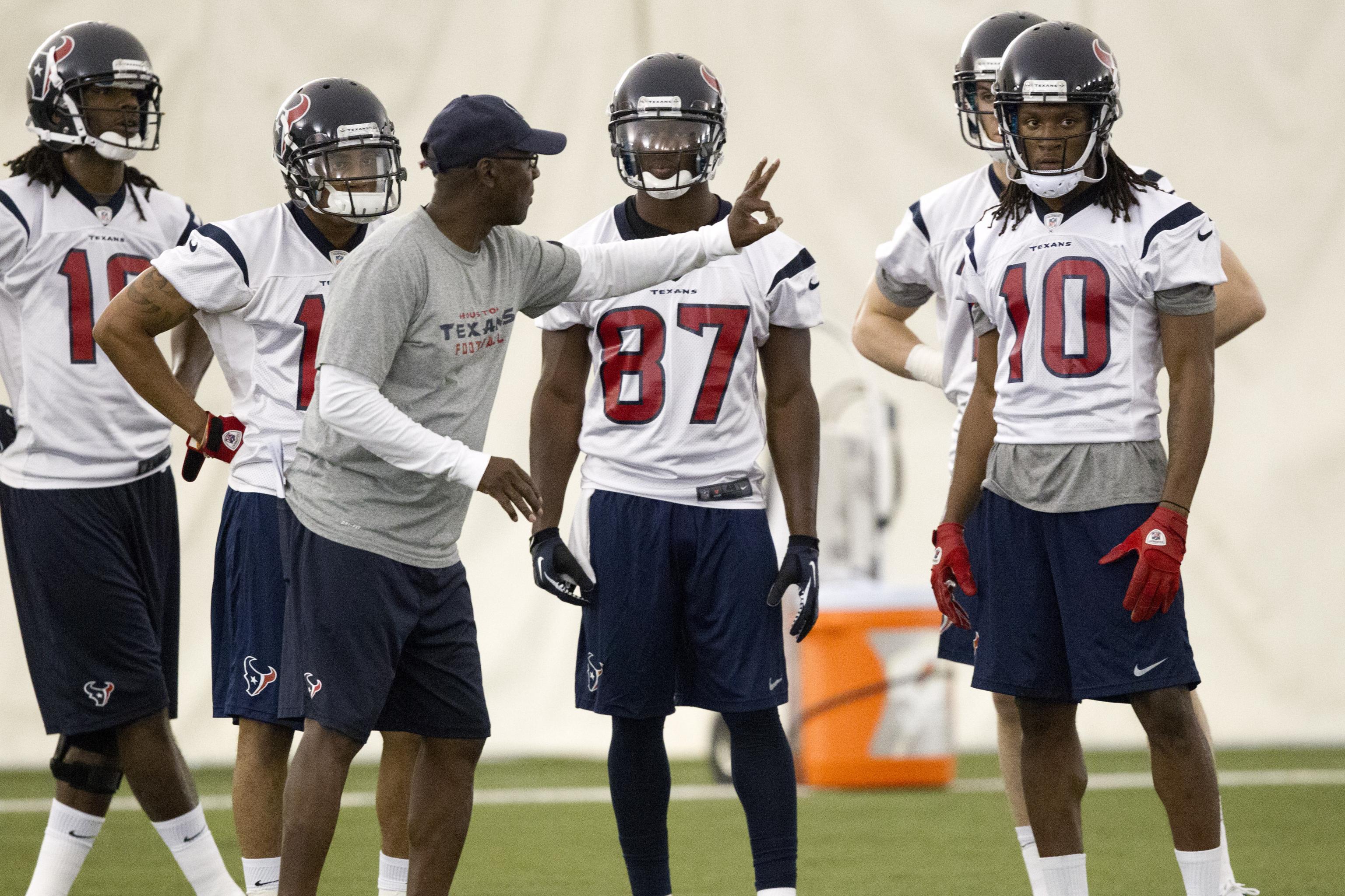 When do the Houston Texans report to training camp?