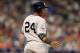 Jul 16, 2013; Flushing , NY, USA; American League infielder Robinson Cano (24) of the New York Yankees reacts after being hit by a pitch in the 2013 All Star Game at Citi Field. Mandatory Credit: John Munson/THE STAR-LEDGER via USA TODAY Sports