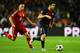 BARCELONA, SPAIN - MAY 01: Cesc Fabregas (R) of Barcelona holds off the challenge of Franck Ribery (L) of Munich during the UEFA Champions League semi final second leg match between Barcelona and FC Bayern Muenchen at Nou Camp on May 1, 2013 in Barcelona, Spain. (Photo by Mike Hewitt/Getty Images)