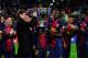 BARCELONA, SPAIN - MAY 19: Head coach Tito Vilanova and Eric Abidal of FC Barcelona holds up the trophy during the celebration after winning the Spanish League after the La Liga match between FC Barcelona and Real Valladolid CF at Camp Nou on May 19, 2013 in Barcelona, Spain. (Photo by David Ramos/Getty Images)