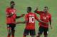 HOUSTON, TX - JULY 15: Jamal Gay #23, Kevin Molino #10 and Andre Boucaud #14 of Trinidad & Tobago celebrate after defeating Honduras 2-0 during the CONCACAF Gold Cup game at BBVA Compass Stadium on July 15, 2013 in Houston, Texas. (Photo by Scott Halleran/Getty Images)