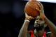 OAKLAND, CA - NOVEMBER 20: Greg Oden #52 of the Portland Trail Blazers shoots against the Golden State Warriors during an NBA game at Oracle Arena on November 20, 2009 in Oakland, California. (Photo by Jed Jacobsohn/Getty Images)
