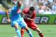 NAPLES, ITALY - MAY 12: Gokhan Inler of Napoli and Salvador Agra of Siena in action during the Serie A match between SSC Napoli and AC Siena at Stadio San Paolo on May 12, 2013 in Naples, Italy. (Photo by Giuseppe Bellini/Getty Images)