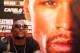NEW YORK, NY - JUNE 24: Floyd Mayweather looks on during a news conference at the Pedestrian Walk in Times Square on June 24, 2013 in New York City. Floyd Mayweather and Canelo Alvarez are scheduled to fight September 14 at the MGM Grand in Las Vegas, Nevada to unifty their junior middleweight world titles. (Photo by Mike Stobe/Getty Images)