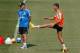 MADRID, SPAIN - JULY 16: Cristiano Ronaldo of Real Madrid warms up while head coach Carlo Ancelotti looks on during a training session at the Valdebebas training ground on July 16, 2013 in Madrid, Spain. (Photo by Gonzalo Arroyo Moreno/Getty Images)
