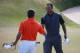 GULLANE, SCOTLAND - JULY 20: Tiger Woods of the United States shakes hands with Lee Westwood of England after finishing the third round of the 142nd Open Championship at Muirfield on July 20, 2013 in Gullane, Scotland. (Photo by Rob Carr/Getty Images)
