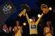 PARIS, FRANCE - JULY 21: Winner of the 2013 Tour de France, Chris Froome of Great Britain and SKY Procycling celebrates on the podium after the twenty first and final stage of the 2013 Tour de France, a processional 133.5KM road stage ending in an evening race around the Champs-Elysees, on July 21, 2013 in Paris, France. (Photo by Bryn Lennon/Getty Images)