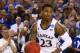 ARLINGTON, TX - MARCH 29: Ben McLemore #23 of the Kansas Jayhawks drives against the Michigan Wolverines during the South Regional Semifinal round of the 2013 NCAA Men's Basketball Tournament at Dallas Cowboys Stadium on March 29, 2013 in Arlington, Texas. (Photo by Ronald Martinez/Getty Images)