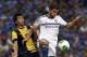KUALA LUMPUR, MALAYSIA - JULY 21: Eden Hazard of Chelsea shields the ball away from Mohd Shakir Shaari of Malaysia during the match between Chelsea and Malaysia XI on July 21, 2013 in Kuala Lumpur, Malaysia. (Photo by Stanley Chou/Getty Images)