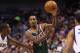 DALLAS, TX - FEBRUARY 26: Brandon Jennings #3 of the Milwaukee Bucks passes the ball against Darren Collison #4 of the Dallas Mavericks at American Airlines Center on February 26, 2013 in Dallas, Texas. NOTE TO USER: User expressly acknowledges and agrees that, by downloading and or using this photograph, User is consenting to the terms and conditions of the Getty Images License Agreement. (Photo by Ronald Martinez/Getty Images)