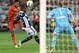 MELBOURNE, AUSTRALIA - JULY 24: Jordan Ibe (L) of Liverpool and Jason Geria of the Victory contest for the ball during the match between the Melbourne Victory and Liverpool at Melbourne Cricket Ground on July 24, 2013 in Melbourne, Australia. (Photo by Michael Dodge/Getty Images)