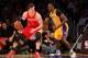 LOS ANGELES, CA - APRIL 17: Omer Asik #3 of the Houston Rockets controls the ball against Dwight Howard #12 of the Los Angeles Lakers at Staples Center on April 17, 2013 in Los Angeles, California. NOTE TO USER: User expressly acknowledges and agrees that, by downloading and or using this photograph, User is consenting to the terms and conditions of the Getty Images License Agreement. (Photo by Stephen Dunn/Getty Images)