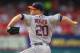 ST. LOUIS, MO - JULY 9: Starter Bud Norris #20 of the Houston Astros pitches against the St. Louis Cardinals at Busch Stadium on July 9, 2013 in St. Louis, Missouri. (Photo by Dilip Vishwanat/Getty Images)