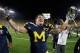 ANN ARBOR, MI - SEPTEMBER 10: Taylor Lewan #77 of the Michigan Wolverines reacts after beating the Notre Dame Fighting Irish 35-31 at Michigan Stadium on September 10, 2010 in Ann Arbor, Michigan. (Photo by Gregory Shamus/Getty Images)