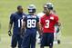 May 20, 2013; Seattle, WA, USA; Seattle Seahawks quarterback Russell Wilson (3) talks with wide receiver Percy Harvin (11) and wide receiver Doug Baldwin (89) during organized team activities at the Virginia Mason Athletic Center Mandatory Credit: Joe Nicholson-USA TODAY Sports