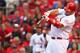 ST. LOUIS, MO - JULY 25: Matt Adams #53 of the St. Louis Cardinals hits an RBI single against the Philadelphia Phillies in the third inning at Busch Stadium on July 25, 2013 in St. Louis, Missouri. (Photo by Dilip Vishwanat/Getty Images)