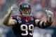 HOUSTON, TX - DECEMBER 16: J.J. Watt #99 of the Houston Texans salutes the fans during the game against the Indianapolis Colts at Reliant Stadium on December 16, 2012 in Houston, Texas. (Photo by Scott Halleran/Getty Images)