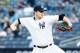 May 15, 2013; Bronx, NY, USA; New York Yankees starting pitcher Phil Hughes (65) pitches against the Seattle Mariners during the first inning at Yankee Stadium. Mandatory Credit: Debby Wong-USA TODAY Sports