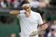 Jun 26, 2013; London, United Kingdom; Roger Federer (SUI) reacts during his match against Sergiy Stakhovsky (UKR) on day three of the 2013 Wimbledon Championships at the All England Lawn Tennis Club. Mandatory Credit: Susan Mullane-USA TODAY Sports