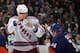 UNIONDALE, NY - DECEMBER 02: Derek Boogaard #94 of the New York Rangers fights with Trevor Gillies #14 of the New York Islanders at the Nassau Coliseum on December 2, 2010 in Uniondale, New York. (Photo by Bruce Bennett/Getty Images)