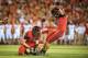 LINCOLN, NE - SEPTEMBER 29: Kicker Brett Maher #96 kicks the ball held by cornerback Jase Dean #31 of the Nebraska Cornhuskers during their game against the Wisconsin Badgers at Memorial Stadium on September 29, 2012 in Lincoln, Nebraska. (Photo by Eric Francis/Getty Images)