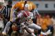 KNOXVILLE, TN - SEPTEMBER 15: Quinton Dunbar #1 of the Florida Gators tackled by A.J. Johnson #45 and Eric Gordon #24 of the Tennessee Volunteers during the second half of play at Neyland Stadium on September 15, 2012 in Knoxville, Tennessee. (Photo by John Sommers II/Getty Images)