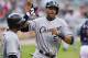 CLEVELAND, OH - JULY 30: Alejandro De Aza #30 celebrates with Alex Rios #51 of the Chicago White Sox after both scored on a double by Adam Dunn #32 during the first inning against the Cleveland Indians at Progressive Field on July 30, 2013 in Cleveland, Ohio. (Photo by Jason Miller/Getty Images)