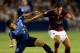 KANSAS CITY, KS - JULY 31: Francesco Totti #10 of AS Roma controls the ball as Tony Beltran #2 of the MLS All-Stars defends during the 2013 Major League Soccer All Star Game at Sporting Park on July 31, 2013 in Kansas City, Kansas. (Photo by Jamie Squire/Getty Images)